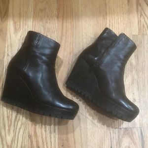 New pair of Prada leather boots